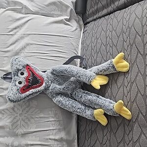 Huggy wuggy plush backpack.